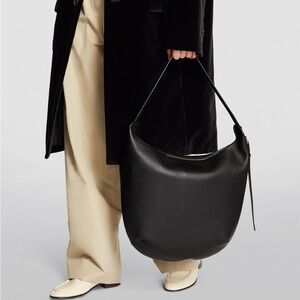 The Row Black Allie Hobo Bag with Gold Hardware